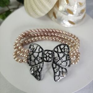 Triple Strand Pearl Bracelet with Gunmetal Bow